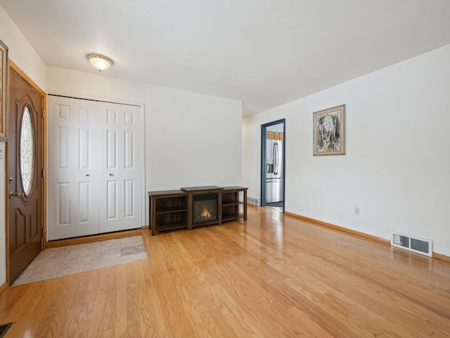 foyer entrance featuring light hardwood / wood-style flooring