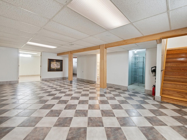 basement with a drop ceiling