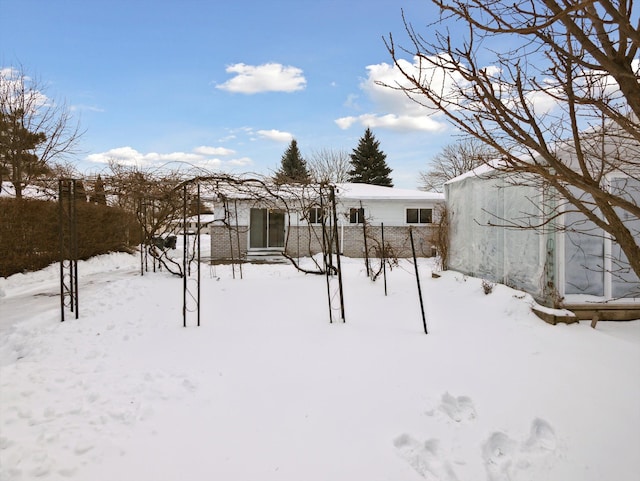 view of snowy yard