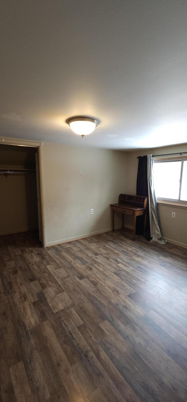 interior space featuring dark wood-type flooring