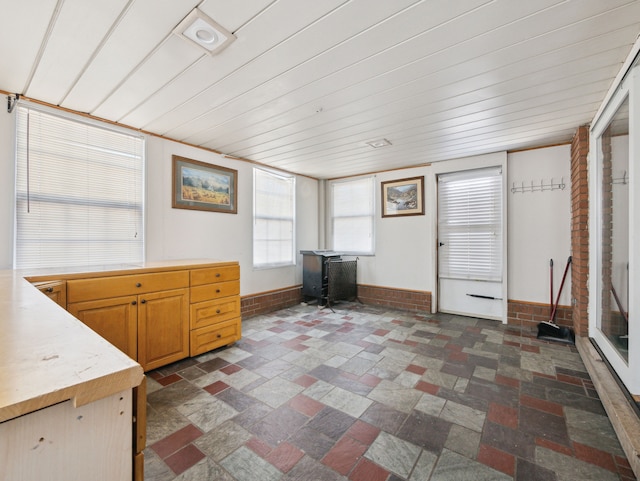 unfurnished office with wood ceiling