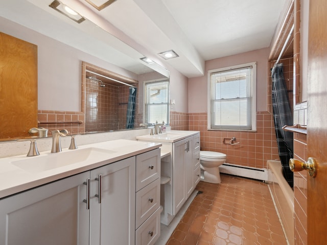 full bathroom with shower / bathtub combination with curtain, baseboard heating, toilet, tile walls, and vanity