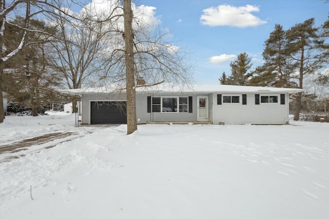 ranch-style house featuring a garage