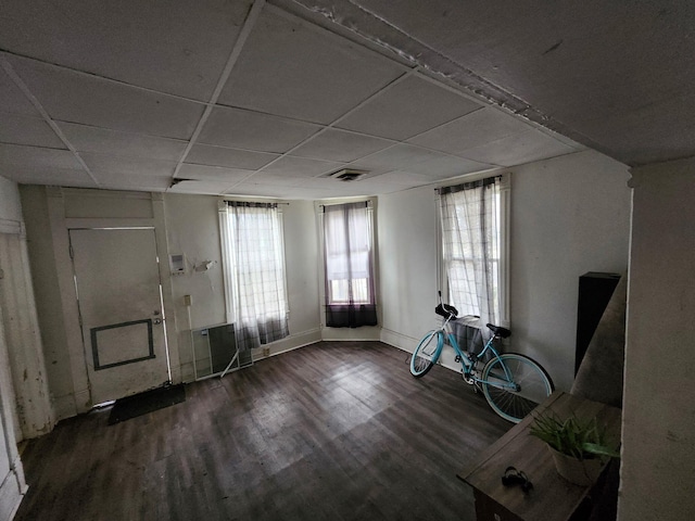 249 Washington Ave, Muskegon, MI 49441 - interior space featuring baseboards, wood finished floors, and a paneled ceiling
