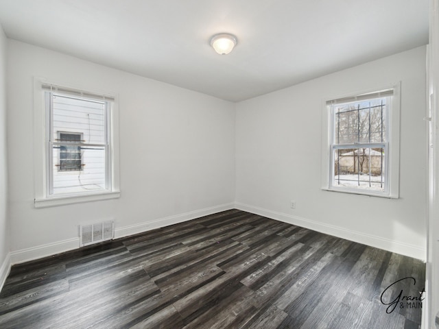 9941 Minock St, Detroit, MI 48228 - empty room with dark wood-type flooring