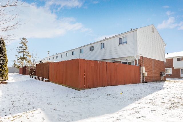 view of snow covered property