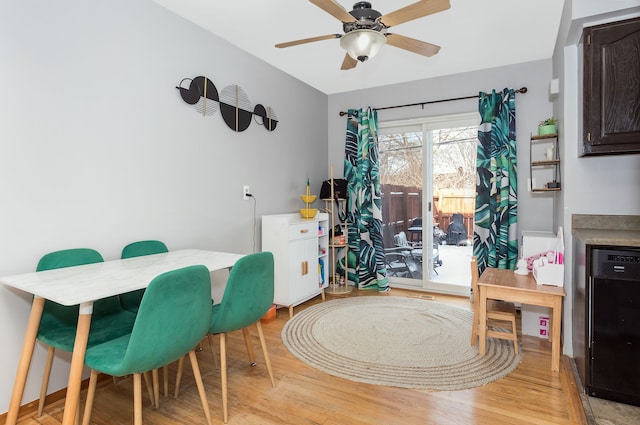 dining area featuring ceiling fan and light hardwood / wood-style floors