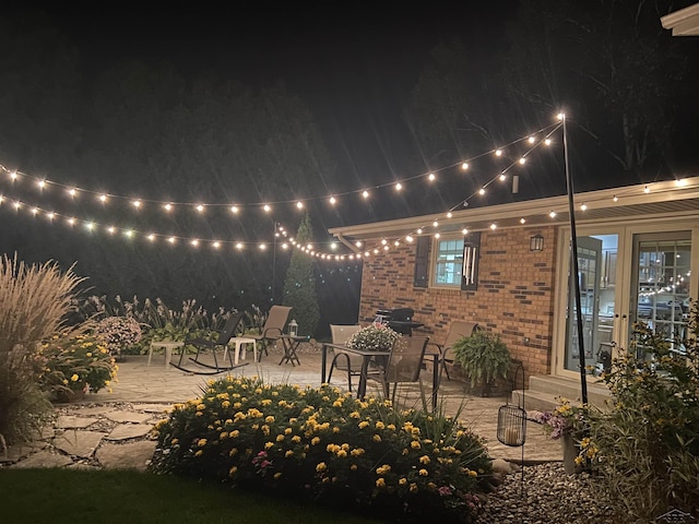 view of patio at night