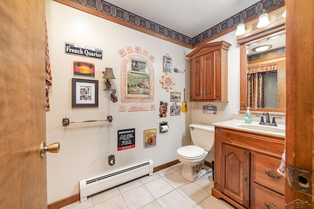 bathroom with vanity, baseboards, tile patterned flooring, toilet, and baseboard heating