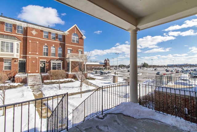 view of snow covered patio