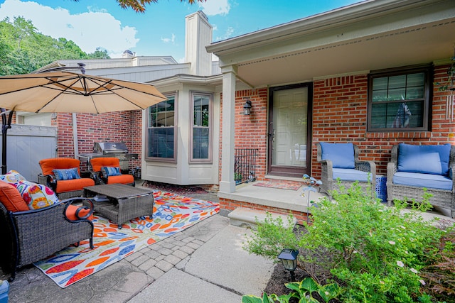 view of patio / terrace with an outdoor hangout area and grilling area