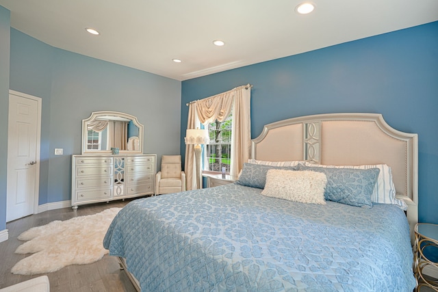 bedroom featuring hardwood / wood-style flooring