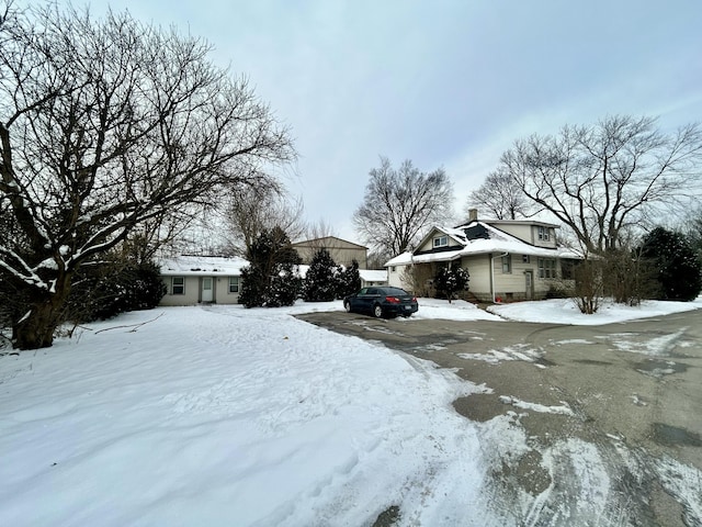 view of yard covered in snow