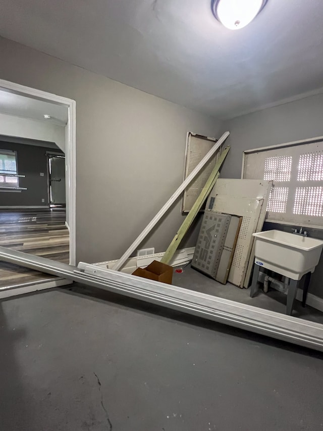 stairway featuring concrete flooring