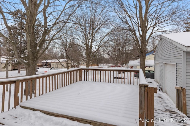 view of snow covered deck