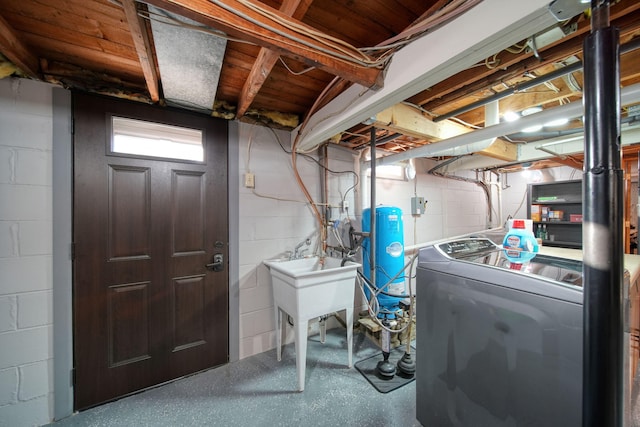 clothes washing area featuring separate washer and dryer