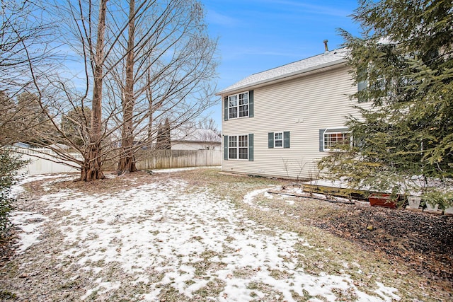 view of snow covered house