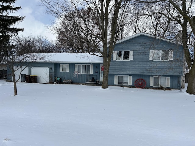 split level home featuring a garage