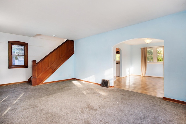 unfurnished living room with carpet