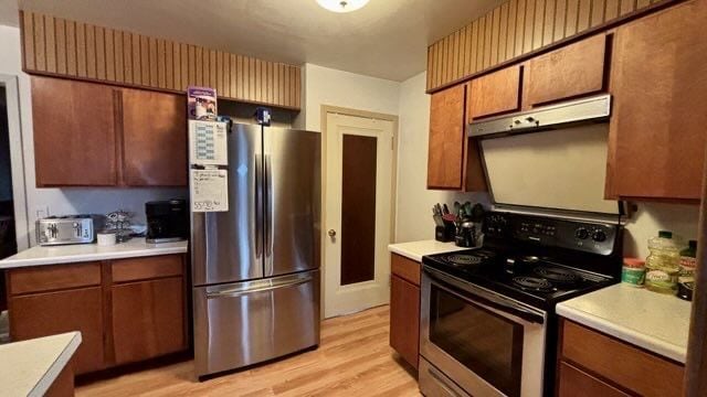 kitchen featuring light hardwood / wood-style floors and stainless steel appliances