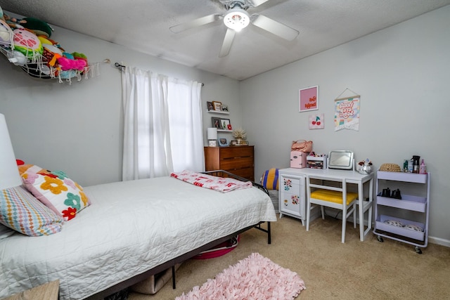 bedroom with light carpet and ceiling fan