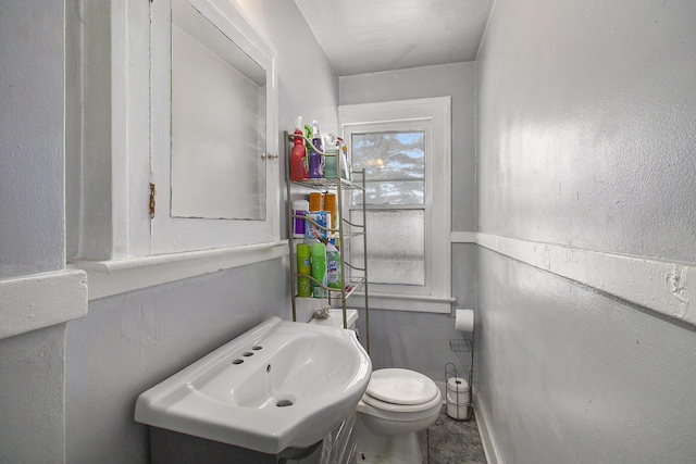 bathroom with sink and toilet