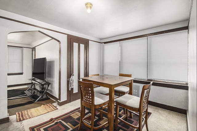 view of carpeted dining area