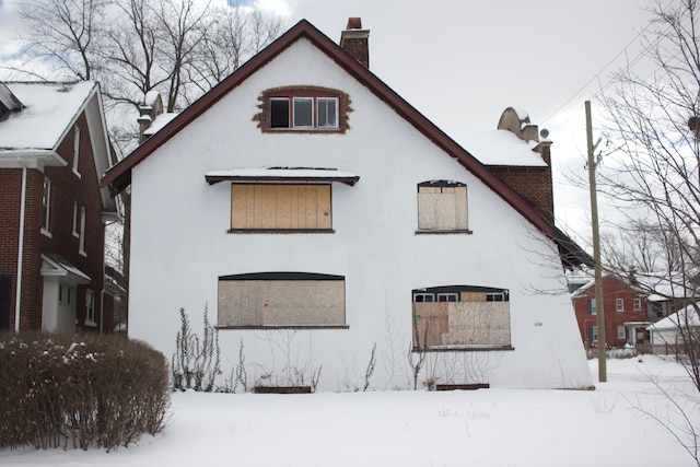 view of snow covered property