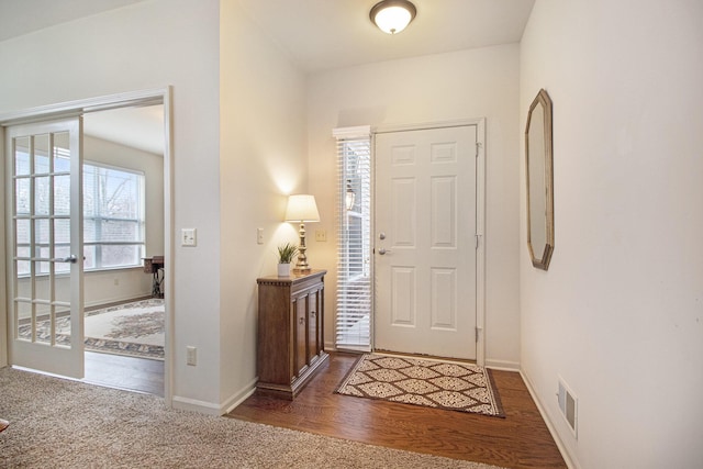 foyer featuring dark hardwood / wood-style floors