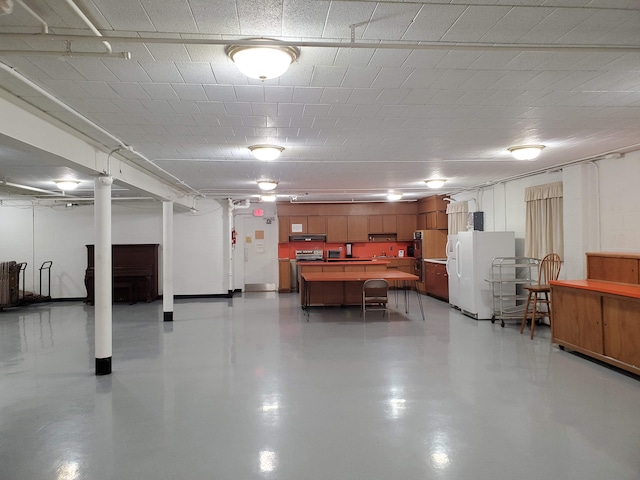 garage featuring white refrigerator