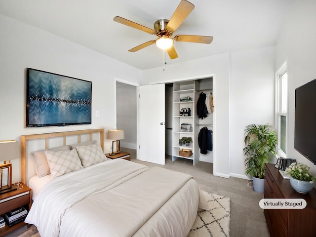 bedroom featuring a closet, ceiling fan, and carpet flooring