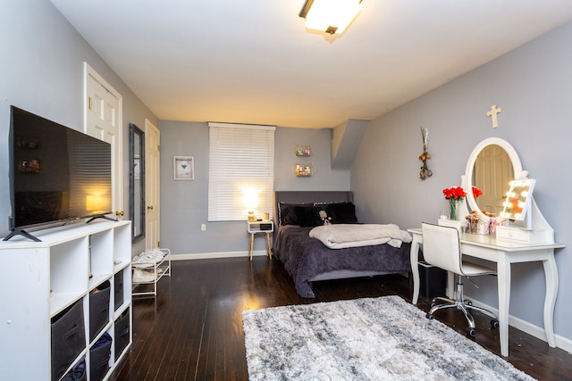 bedroom featuring dark hardwood / wood-style flooring