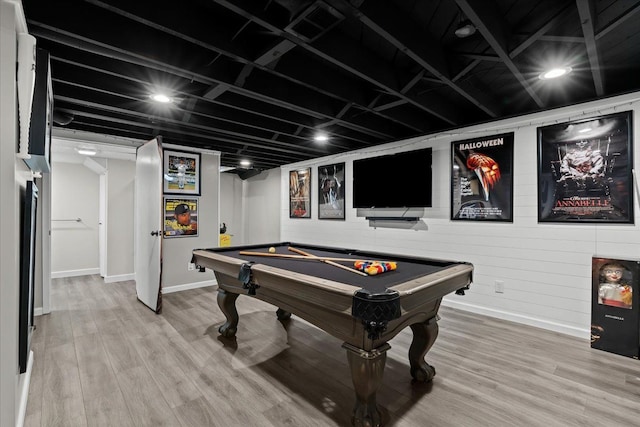 recreation room featuring hardwood / wood-style flooring and pool table