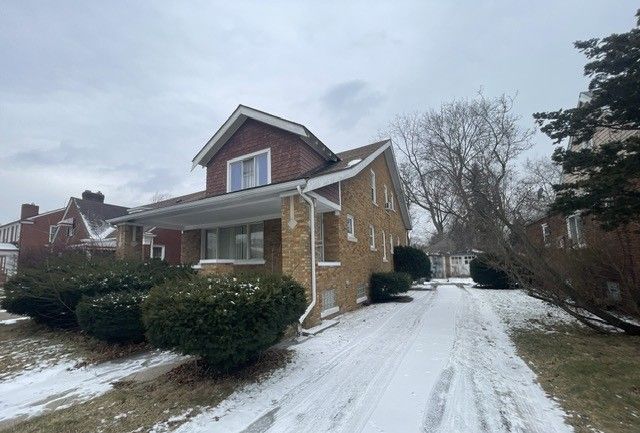 view of snow covered property