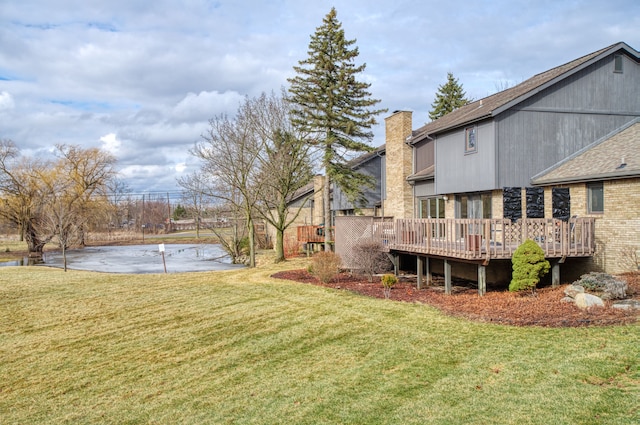 view of yard with a deck