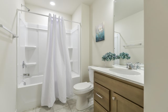 full bathroom featuring shower / tub combo with curtain, toilet, vanity, and tile patterned flooring