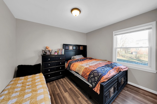 bedroom featuring dark hardwood / wood-style floors