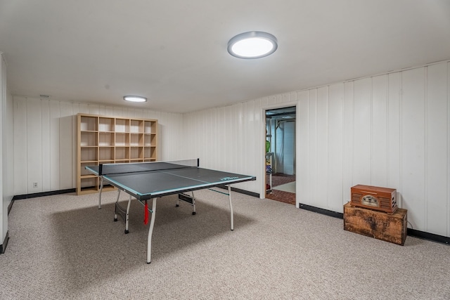 recreation room with carpet flooring