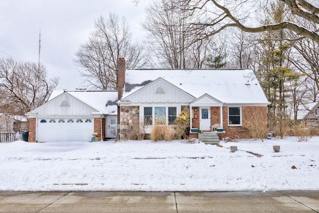 view of front facade featuring a garage, brick siding, board and batten siding, and a chimney