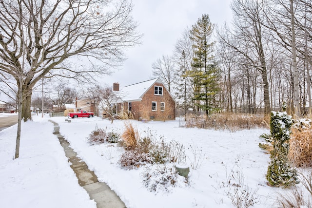 view of yard layered in snow