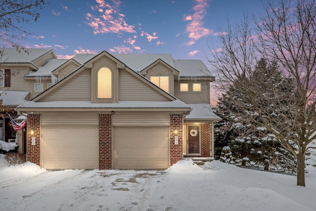 front facade with a garage