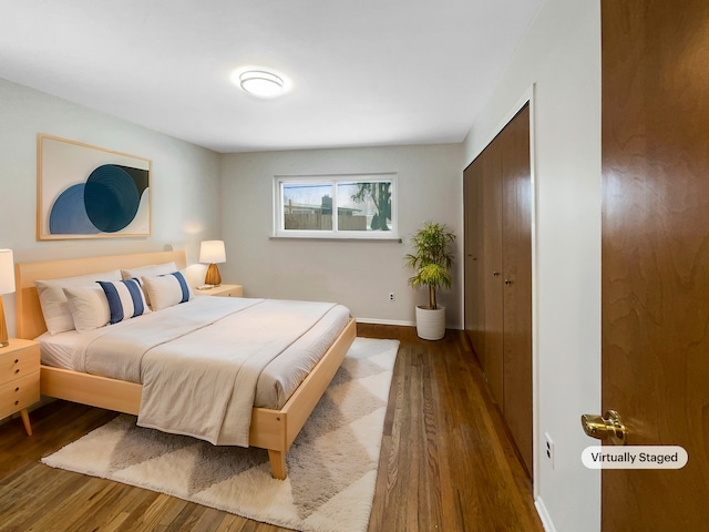 29743 Chelmsford Rd, Southfield, MI 48076 - bedroom with baseboards and wood finished floors