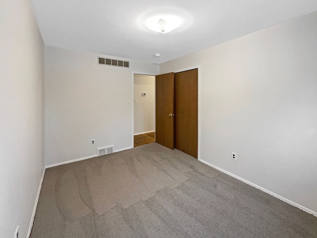 29743 Chelmsford Rd, Southfield, MI 48076 - spare room with carpet flooring, visible vents, and baseboards