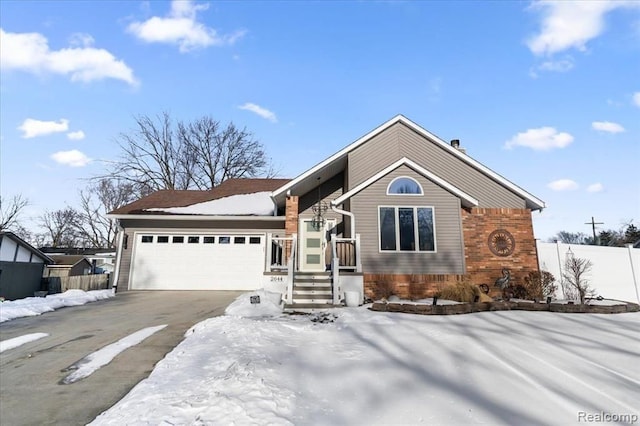 view of front of home with a garage