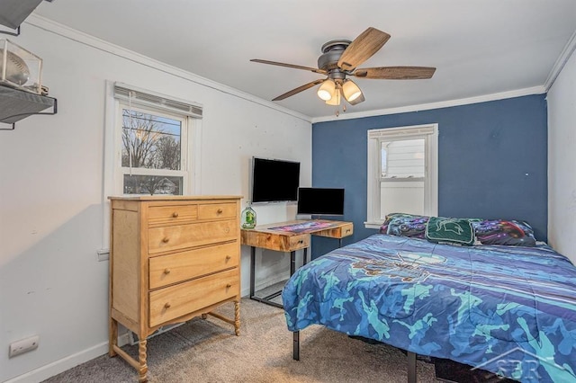 bedroom with carpet, ceiling fan, and ornamental molding