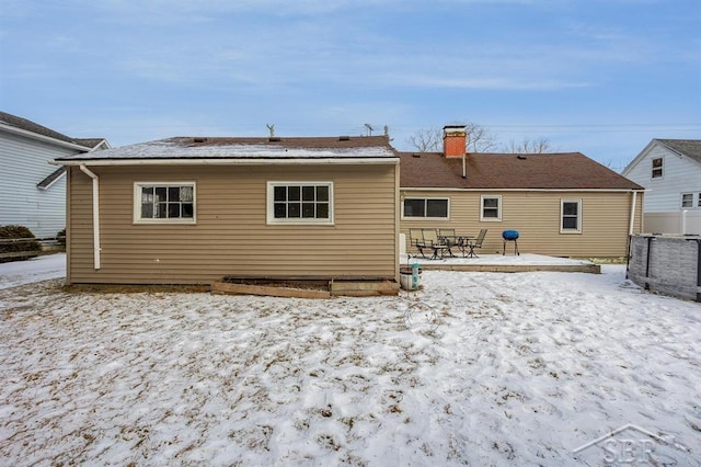 view of snow covered house