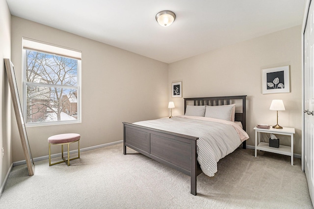 bedroom with light colored carpet