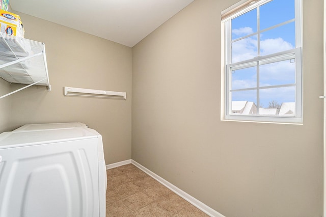 washroom featuring washer and dryer