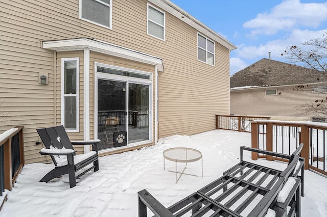 view of snow covered patio