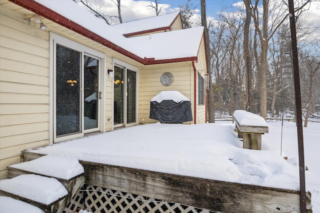 view of snow covered patio